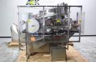 Used New England Machinery Model NEHCL-350 Bulk Bottle Unscrambler. Machine is capable of speeds up to 350 bottles per minute. Has a container size range of 5/8