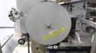 Used New England Machinery Model NEHCL-350 Bulk Bottle Unscrambler. Machine is capable of speeds up to 350 bottles per minute. Has a container size range of 5/8