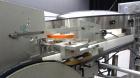 Used New England Machinery Model NEHCL-350 Bulk Bottle Unscrambler. Machine is capable of speeds up to 350 bottles per minute. Has a container size range of 5/8