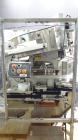 Used New England Machinery Model NEHCL-350 Bulk Bottle Unscrambler. Machine is capable of speeds up to 350 bottles per minute. Has a container size range of 5/8
