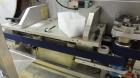 Used New England Machinery Model NEHCL-350 Bulk Bottle Unscrambler. Machine is capable of speeds up to 350 bottles per minute. Has a container size range of 5/8
