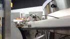 Used New England Machinery Model NEHCL-350 Bulk Bottle Unscrambler. Machine is capable of speeds up to 350 bottles per minute. Has a container size range of 5/8