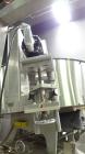 Used New England Machinery Model NEHCL-350 Bulk Bottle Unscrambler. Machine is capable of speeds up to 350 bottles per minute. Has a container size range of 5/8