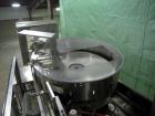 Used New England NECHL350AJ Bulk Plastic Bottle Unscrambler. Includes ionized air cleaner. Has 36