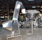 Used Mengibar 44” Diameter Bottle Unscrambler, Model MI-2, Serial #306015, Built 1997. Includes an integrated elevator, model EC300/2000, serial #306015. SELLING PRICE AS IS, WHERE IS, SANFORD, NC.