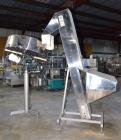 Used Mengibar 44” Diameter Bottle Unscrambler, Model MI-2, Serial #306015, Built 1997. Includes an integrated elevator, model EC300/2000, serial #306015. SELLING PRICE AS IS, WHERE IS, SANFORD, NC.