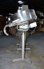 Used Mengibar 44” Diameter Bottle Unscrambler, Model MI-2, Serial #306015, Built 1997. Includes an integrated elevator, model EC300/2000, serial #306015. SELLING PRICE AS IS, WHERE IS, SANFORD, NC.