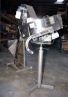 Used Mengibar 44” Diameter Bottle Unscrambler, Model MI-2, Serial #306015, Built 1997. Includes an integrated elevator, model EC300/2000, serial #306015. SELLING PRICE AS IS, WHERE IS, SANFORD, NC.