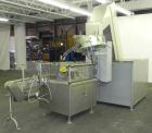 Used Omega Design Bottle Unscrambler, Model 2D1RPC8. 8 Station, Allen-Bradley SLC 5/03 PLC controls. Air cleaner, has Palace bottle elevator with 12