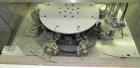 Used Omega Design Bottle Unscrambler, Model 2D1RPC8. 8 Station, Allen-Bradley SLC 5/03 PLC controls. Air cleaner, has Palace bottle elevator with 12