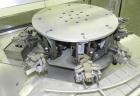 Used Omega Design Bottle Unscrambler, Model 2D1RPC8. 8 Station, Allen-Bradley SLC 5/03 PLC controls. Air cleaner, has Palace bottle elevator with 12