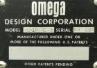 Used Omega Design Bottle Unscrambler, Model 2D1RPC8. 8 Station, Allen-Bradley SLC 5/03 PLC controls. Air cleaner, has Palace bottle elevator with 12