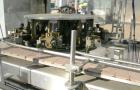 Used Omega Design Bottle Unscrambler, Model 2D1RPC8. 8 Station, Allen-Bradley SLC 5/03 PLC controls. Air cleaner, has Palace bottle elevator with 12