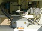 Used Omega Design Bottle Unscrambler, Model 2D1RPC8. 8 Station, Allen-Bradley SLC 5/03 PLC controls. Air cleaner, has Palace bottle elevator with 12