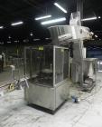 Used Omega Design Corp Model 4D-RP2-12 Bulk Bottle Unscrambler. Capable of speeds over 200 bottles per minute. Set up with 12 rotary pockets. Has 4' (48