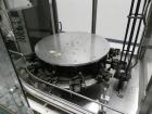 Used Omega Design Corp Model 4D-RP2-12 Bulk Bottle Unscrambler. Capable of speeds over 200 bottles per minute. Set up with 12 rotary pockets. Has 4' (48