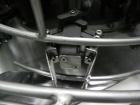 Used Omega Design Corp Model 4D-RP2-12 Bulk Bottle Unscrambler. Capable of speeds over 200 bottles per minute. Set up with 12 rotary pockets. Has 4' (48