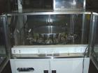 Used Omega Design Bulk Bottle Unscrambler, Model 4D-RP2-18. Capable of speeds over 250 BPM. Has exterior bottle air cleaner, bulk bottle elevator. 1/60/120V.