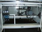 Used Omega Design Bulk Bottle Unscrambler, Model 4D-RP2-18. Capable of speeds over 250 BPM. Has exterior bottle air cleaner, bulk bottle elevator. 1/60/120V.