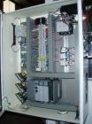 Used Omega Design Bulk Bottle Unscrambler, Model 4D-RP2-18. Capable of speeds over 250 BPM. Has exterior bottle air cleaner, bulk bottle elevator. 1/60/120V.