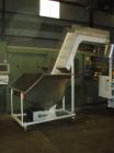 Used Omega Design Bulk Bottle Unscrambler, Model 4D-RP2-18. Capable of speeds over 250 BPM. Has exterior bottle air cleaner, bulk bottle elevator. 1/60/120V.