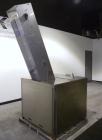 Used Omega Design feeder for Bottle Unscrambler,model H-1-18 bulk bottle elevator. Last running 15, 30, 60cc plastic bottles.