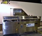Used Pace Omniline Model M 300 Bulk Bottle Unscrambler with integrated elevator. Capable of speeds from 10 to 400 bottles per minute. Can handle bottles from 30cc to 1000cc with changeparts. Pharma-L...