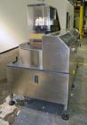 Used Pace Omniline Model M 300 Bulk Bottle Unscrambler with integrated elevator. Capable of speeds from 10 to 400 bottles per minute. Can handle bottles from 30cc to 1000cc with changeparts. Pharma-L...