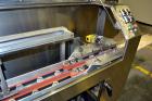 Used Pace Omniline Model M 300 Bulk Bottle Unscrambler with integrated elevator. Capable of speeds from 10 to 400 bottles per minute. Can handle bottles from 30cc to 1000cc with changeparts. Pharma-L...