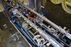 Used Pace Packaging Corporation Omni-Line Bottle Unscrambler, Model M400SS D, Stainless Steel. Capable of approximately 200 bottles per minute. Approximate  48” diameter disc, orientate belt.  3/60/4...