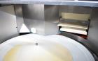 Used- Pace Packaging Bulk Bottle Unscrambler, Model M400. Capable of orienting approximately 20-350 bottles a minute, depend...