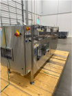 Used Pace Omni-Line Bulk Bottle Unscrambler, Model M400. Is capable of speeds from 20-400 bottles a minute, depending on size and application. Includes Pace bottle feeder. Has a 48