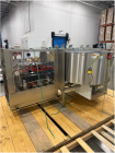 Used Pace Omni-Line Bulk Bottle Unscrambler, Model M400. Is capable of speeds from 20-400 bottles a minute, depending on size and application. Includes Pace bottle feeder. Has a 48