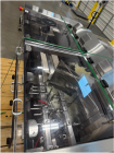 Used Pace Omni-Line Bulk Bottle Unscrambler, Model M400. Is capable of speeds from 20-400 bottles a minute, depending on size and application. Includes Pace bottle feeder. Has a 48