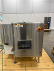 Used Pace Omni-Line Bulk Bottle Unscrambler, Model M400. Is capable of speeds from 20-400 bottles a minute, depending on size and application. Includes Pace bottle feeder. Has a 48