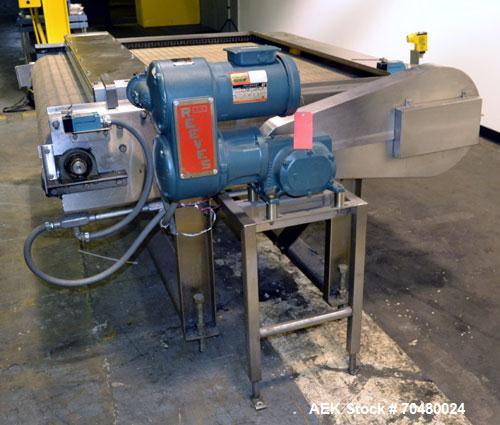 Used Nercon Accumulation Conveyor/Table, Stainless Steel. Approximate 60” wide x 48” long plastic belt with automatic push bar. Driven by a 1/2hp Reeves variable speed gear motor. Stainless steel fra...