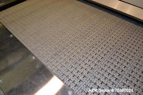 Used Nercon Accumulation Conveyor/Table, Stainless Steel. Approximate 60” wide x 48” long plastic belt with automatic push bar. Driven by a 1/2hp Reeves variable speed gear motor. Stainless steel fra...