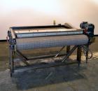 Used Nercon Accumulation Conveyor/Table, Stainless Steel. Approximate 60” wide x 48” long plastic belt with automatic push bar. Driven by a 1/2hp Reeves variable speed gear motor. Stainless steel fra...