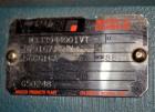 Used Nercon Accumulation Conveyor/Table, Stainless Steel. Approximate 60” wide x 48” long plastic belt with automatic push bar. Driven by a 1/2hp Reeves variable speed gear motor. Stainless steel fra...