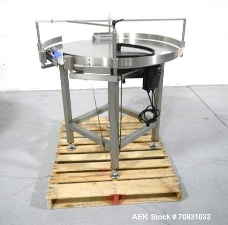 Used Accumulation Table, 42" Diameter, Stainless Steel. On stand with motor drive.