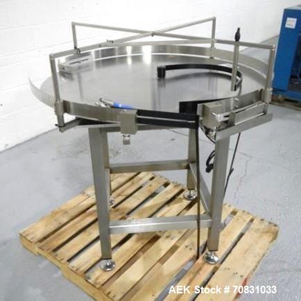 Used Accumulation Table, 42" Diameter, Stainless Steel. On stand with motor drive.