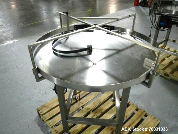 Used Accumulation Table, 42" Diameter, Stainless Steel. On stand with motor drive.