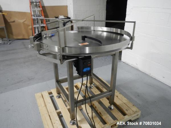 Used Accumulation Table, 42" Diameter, Stainless Steel. On stand with motor drive.