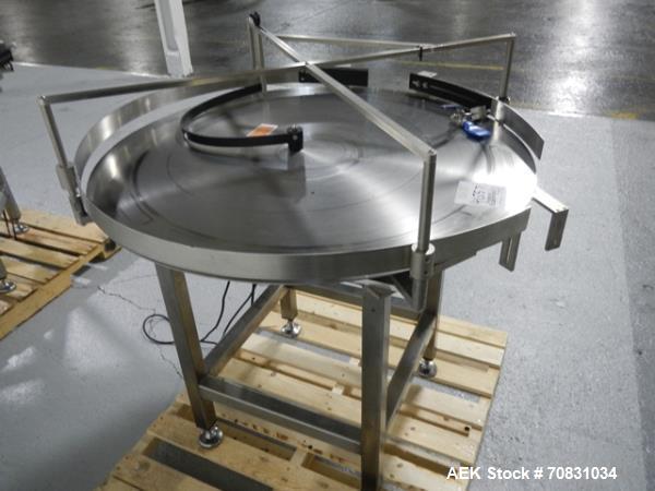 Used Accumulation Table, 42" Diameter, Stainless Steel. On stand with motor drive.