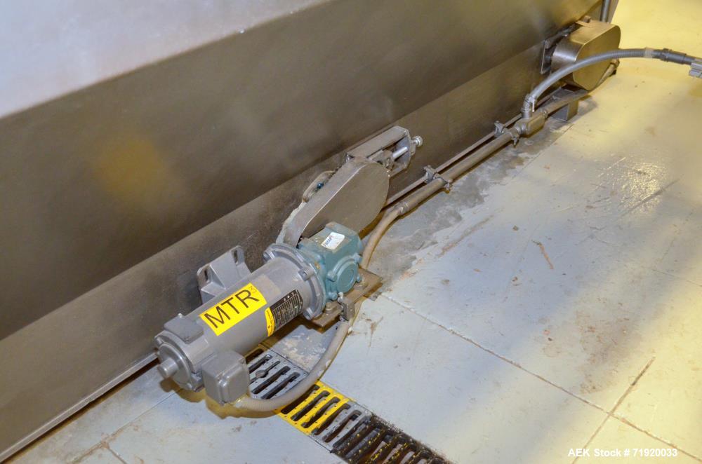 Used Bulk bottle live bottom hopper with integrated stainless steel elevator.