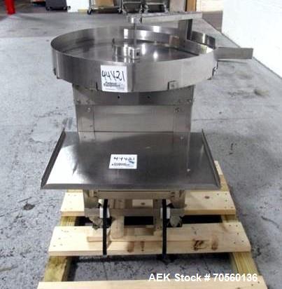Used Garvey 30" diameter accumulation table, model 1546, stainless steel construction, 1/4 hp motor with speed control, 115 volt, with 24" x 17" table mounted on side, serial #9533.