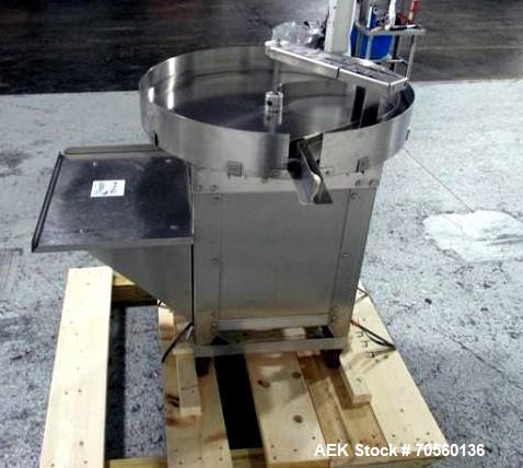 Used Garvey 30" diameter accumulation table, model 1546, stainless steel construction, 1/4 hp motor with speed control, 115 volt, with 24" x 17" table mounted on side, serial #9533.