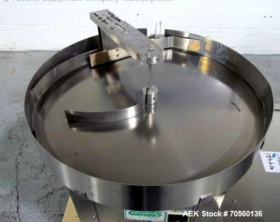 Used Garvey 30" diameter accumulation table, model 1546, stainless steel construction, 1/4 hp motor with speed control, 115 volt, with 24" x 17" table mounted on side, serial #9533.