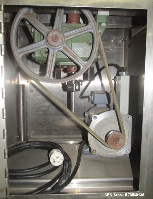 Used Garvey 30" diameter accumulation table, model 1546, stainless steel construction, 1/4 hp motor with speed control, 115 volt, with 24" x 17" table mounted on side, serial #9533.