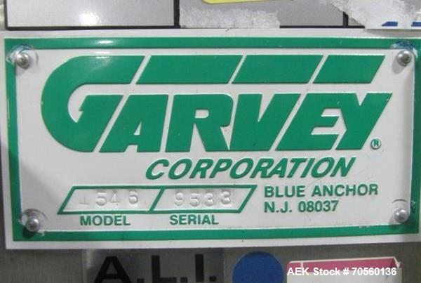 Used Garvey 30" diameter accumulation table, model 1546, stainless steel construction, 1/4 hp motor with speed control, 115 volt, with 24" x 17" table mounted on side, serial #9533.